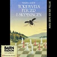 Tordyveln Flyger i Skymningen